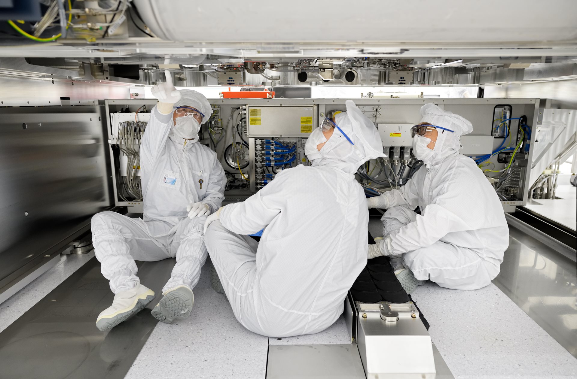 Technicians working in an ASML cleanroom