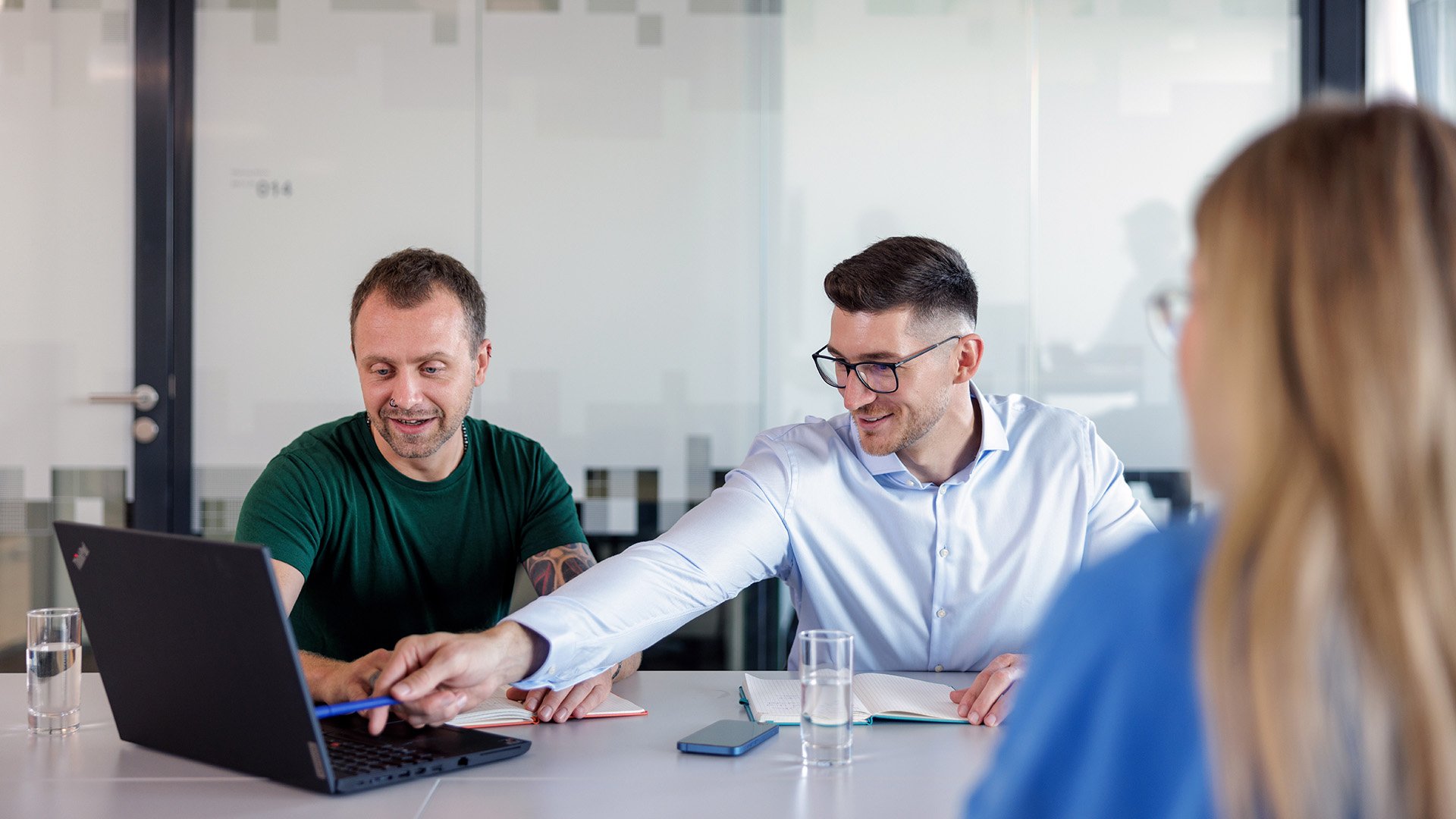 ASML employees collaborating in a meeting