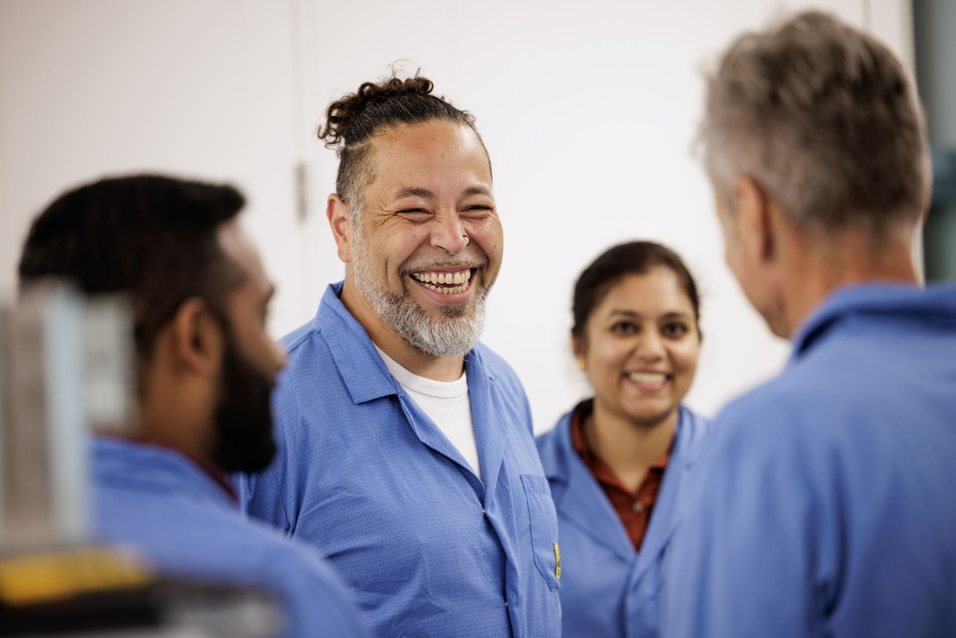 Group of employees discussing work 